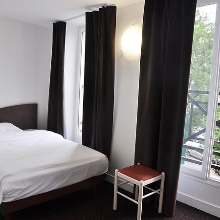 Hotel De La Tour Paris Værelse billede