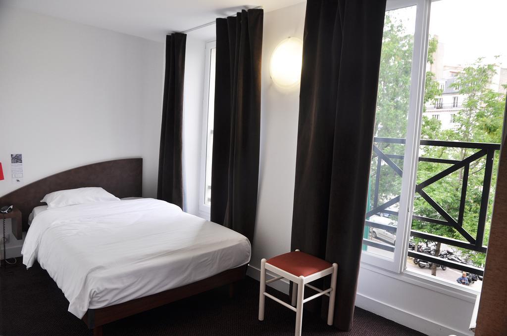 Hotel De La Tour Paris Værelse billede